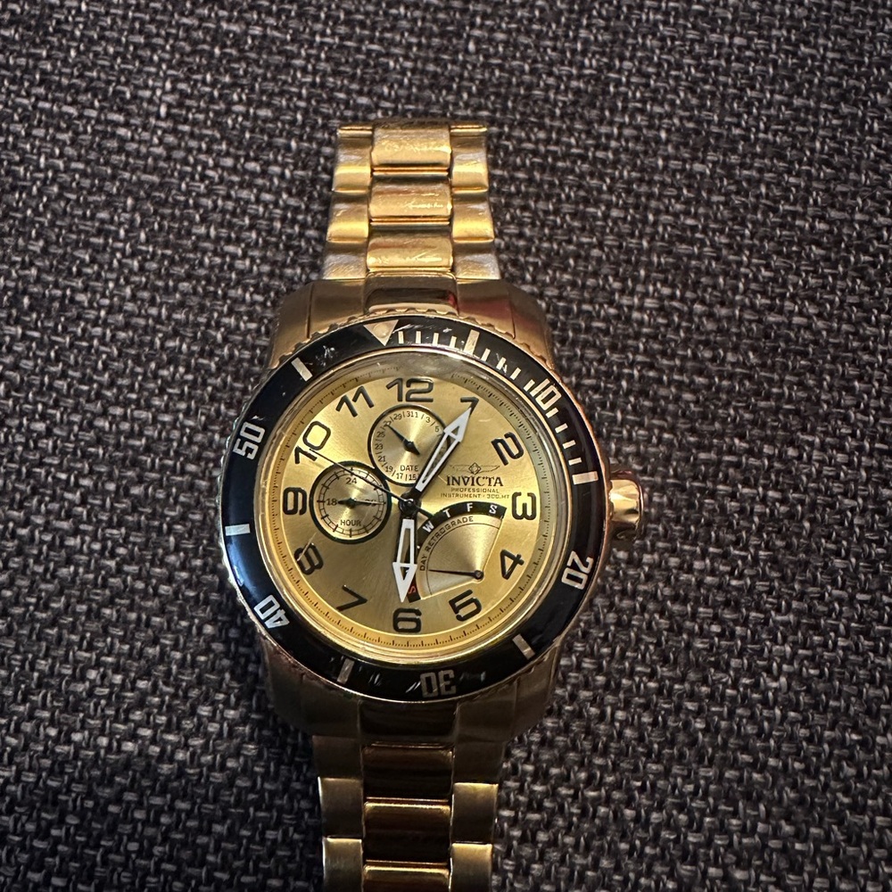 Invicta Gold and Black Chronograph Watch